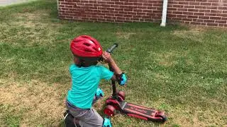 Isaiah on his scooter