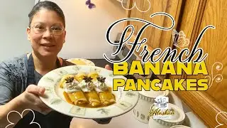 French crepes stuffed with bananas and covered in an amazing homemade caramel sauce. YUM!