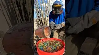Molten metal poured in water beads to make art #art #sculpture