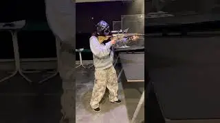 My daughter, shooting my H&K MR223 A3 11.5
