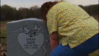 Patricia Owens visiting Amina and Sarah's headstone