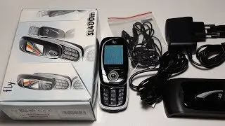 Купил капсулу времени. Fly SL400M из 2006 года. Новый в пленках