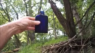 Metal Detecting In The River Collecting Bottles