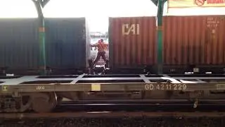 Risky Train Travel, Tegal Train Station, Java, Indonesia