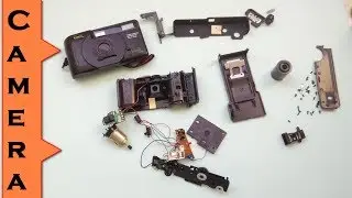 what's Inside an old roll camera ( camera tear down)