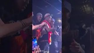 6ix9ine jumps in the crowd while performing live at Amsterdam Hallandale in Florida