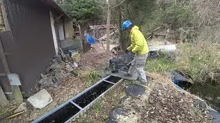 Nature Wonderland; pumping water to the hilltop continued with a handmade hose clamp 20250331