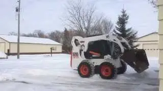 Bobcat S205 Plowing Snow