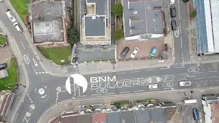 Cinematic Drone Video of Building Exterior for BNM Builders - CreativeEd