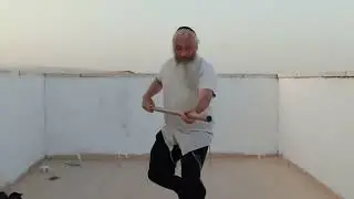Thrusting and whirling the 4 foot staff for 2. degree black belt