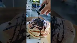 Indulging in fluffy stacks of pancake perfection! #food #dessert #shorts #viralvideo #youtubeshorts