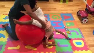 Pediatric Physical Therapy - Sit-ups on Therapy Ball