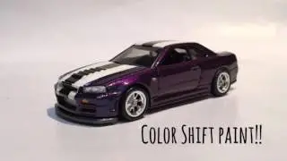 Pair of custom Hot Wheels NISSAN SKYLINE GT-R R34 by Gooberspad