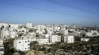 Israel: Government passes controversial West Bank settlement law in late night vote