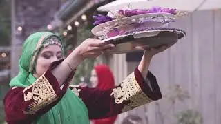 A whimsical Afghan henna party in a garden