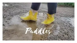 ASMR 🎧 Splashing puddles in yellow rubber boots. Oddly satisfying fun.