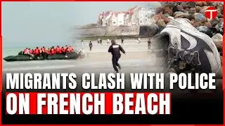 Police confront migrants attempting Channel crossing on French beach