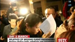 Beijing Police expedite passport procedures for the relatives of missing flight passengers.