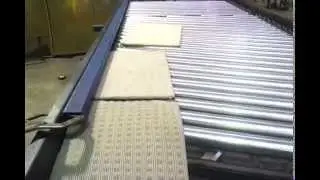 Small carpet samples on driven roller