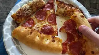 Eating Some Pizza And Cheese Sticks From Pizza Hut