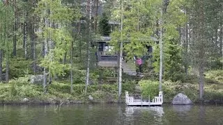 Rock and Lake rental cottage surrounded by lakeside nature, Finland