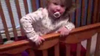 Claira climbs out of crib
