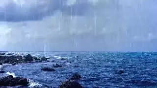 Seamless Loop Sea Waves And Heavy Rain On The Rocky Fishing Beach At The Village