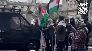 Shocking moment van drives into pro-Palestinian protesters outside Cardiff University