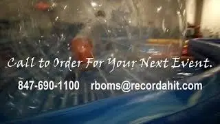 Human Spheres Racing Track with Record-A-Hit Entertainment