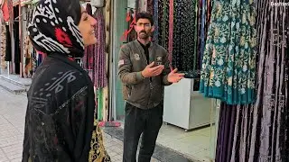 Leila and Shahin go to the market and Shahin is buying clothes for both Leila and Khushali.