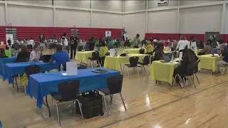 Crowds pack DeKalb County School District job fair