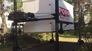 Loading the PODS container on the truck