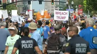 Protesters and 'baby blimp' balloon gather ahead of Trump's re-election launch | AFP