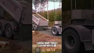Tandem Dump Trucks Laying Gravel: Fast Road Construction in Action!