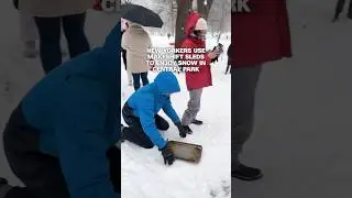 New Yorkers use makeshift sleds to enjoy snow in Central Park
