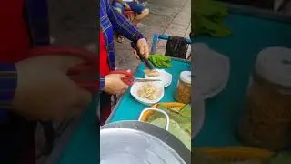 Street breakfast with grilled sticky rice + banana covered with coconut milk | Saigon street food
