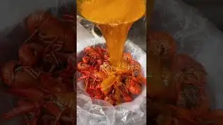 Making love crawfish Louisiana style dipping with Cajun sauce