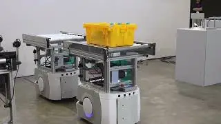 VideoVault Stock Video: Robots transport containers in an AI-powered logistics company