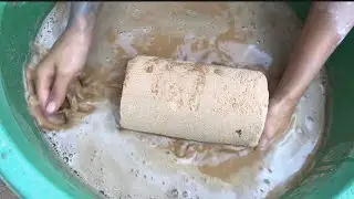 Pure golden sand cylinders nonstop water crumbling satisfying video