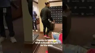Roman Reigns meets a young fan!