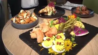 Tasting food and drinks at Merchant & Trade