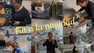 Cocinando y quitando los adornos  fin a la navidad .