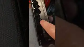 Removing the X3M logo from the center console trim.