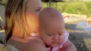 Loving Mother Kissing Baby Outdoors Stock Video