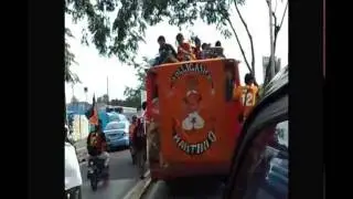 Persija fans travelling by bus to a football game in Jakarta, Indonesia