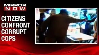 Two Bengaluru cops caught RED-HANDED for collecting bribes | CAUGHT ON CAMERA