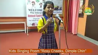 Beautiful girl reciting Rosy cheeks, dimple Chin Poem at The Indopride School