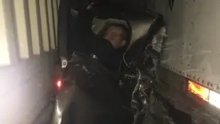He was sandwiched between semi trucks