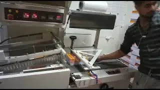 notebook packaging machine automatic in heat shrink wrapper string tunnel