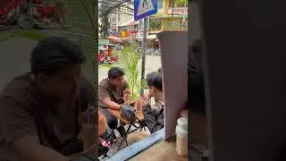 Phnom Penh on street 136 morning drinking Milo dinosaur at Teh Tarick shop #short